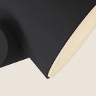 The carbon Aim Floor Light from Gantri close up.