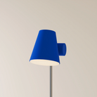 The cobalt Aim Floor Light from Gantri with the chrome rod option.