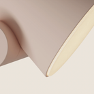 The coral Aim Floor Light from Gantri close up.