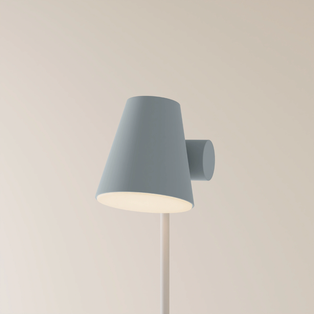 The fog Aim Floor Light from Gantri with the white rod option.