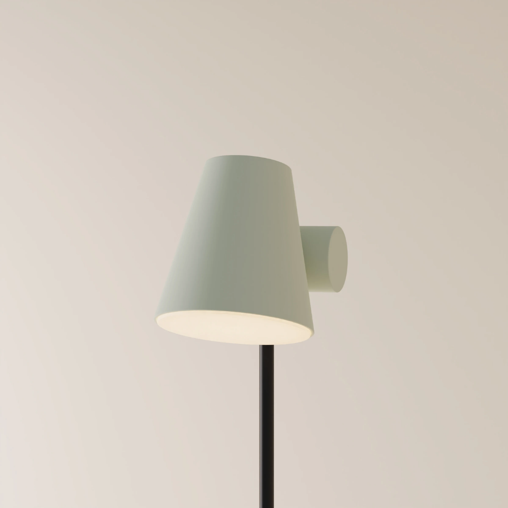 The meadow Aim Floor Light from Gantri with the black rod option.
