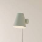 The white Aim Floor Light from Gantri with the chrome rod option.