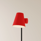 The poppy Aim Floor Light from Gantri with the black rod option.