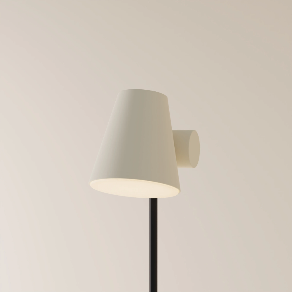 The sand Aim Floor Light from Gantri with the black rod option.