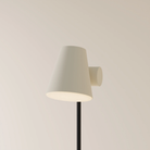 The sand Aim Floor Light from Gantri with the black rod option.