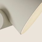 The sand Aim Floor Light from Gantri close up.