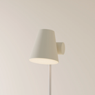 The sand Aim Floor Light from Gantri with the white rod option.