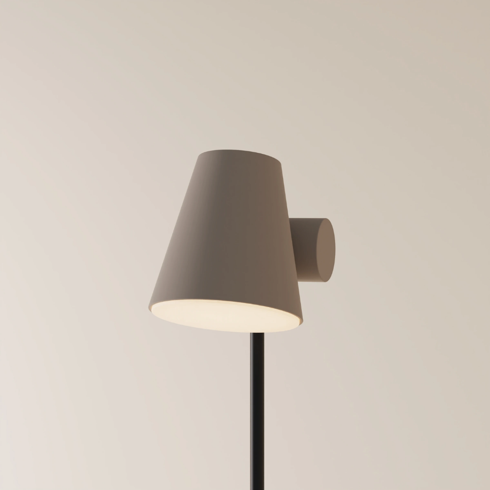 The smoke Aim Floor Light from Gantri with the black rod option.