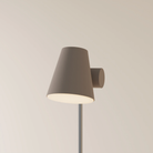 The smoke Aim Floor Light from Gantri with the chrome rod option.