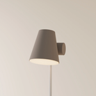 The smoke Aim Floor Light from Gantri with the white rod option.