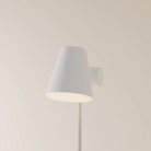 The snow Aim Floor Light from Gantri with the white rod option.