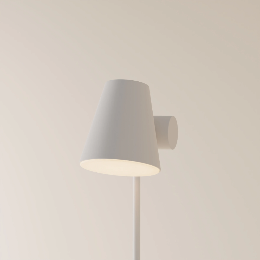 The stone Aim Floor Light from Gantri with the white rod option.
