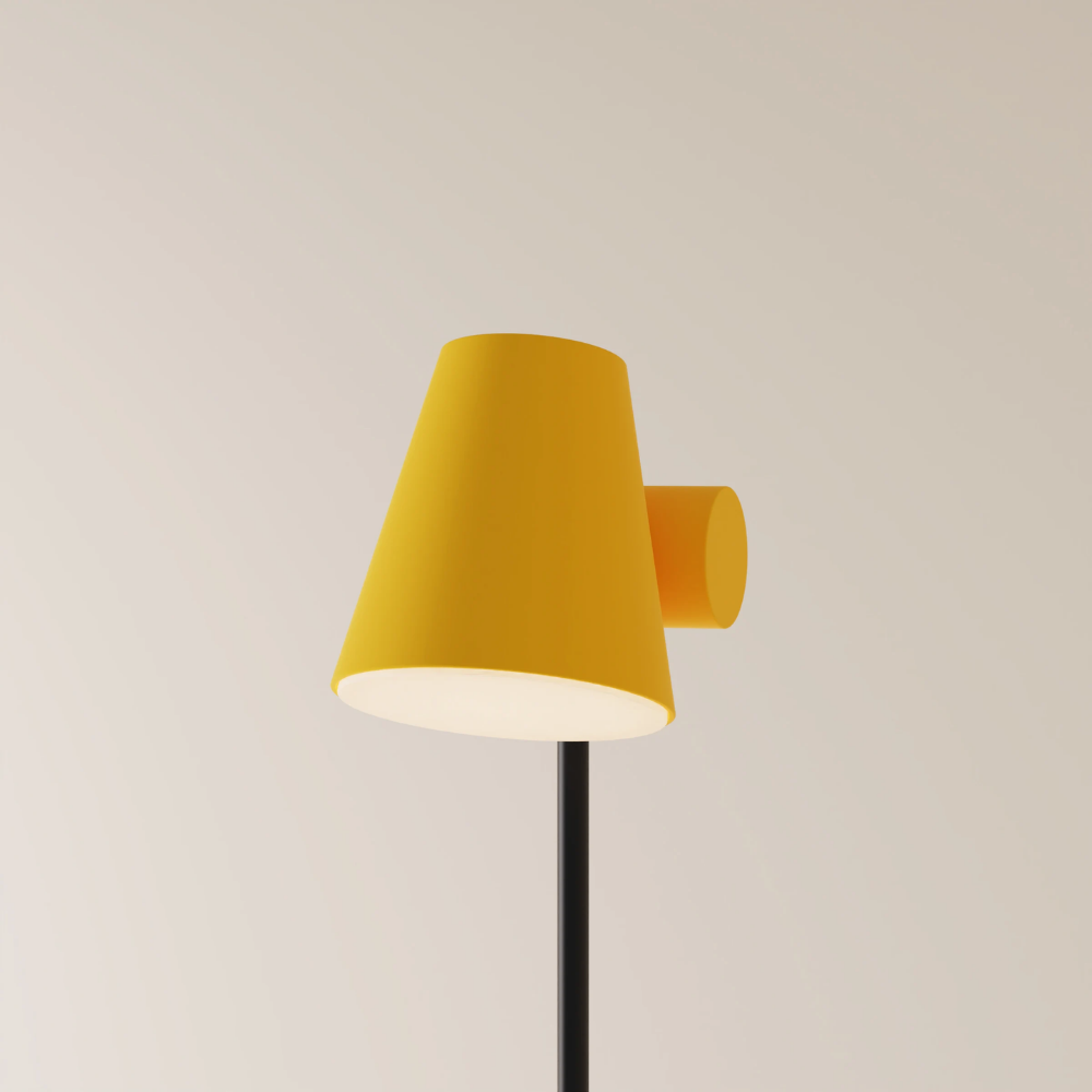 The sunrise Aim Floor Light from Gantri with the black rod option.