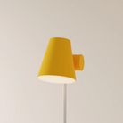 The sunrise Aim Floor Light from Gantri with the white rod option.