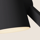 The carbon Aim Task Light from Gantri close up.