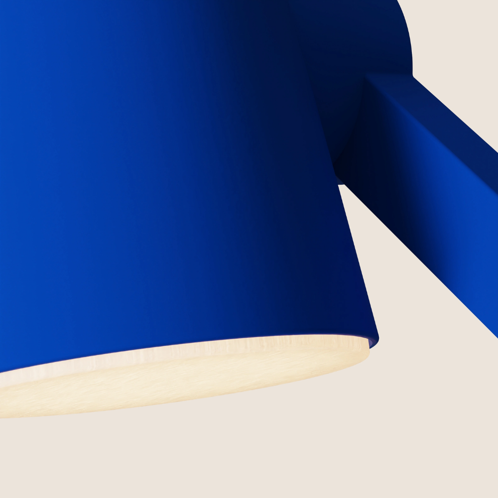 The cobalt Aim Task Light from Gantri close up.