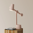 The coral Aim Task Light from Gantri.