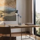 The fog Aim Task Light from Gantri in a home office.