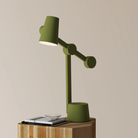 The olive Aim Task Light from Gantri.