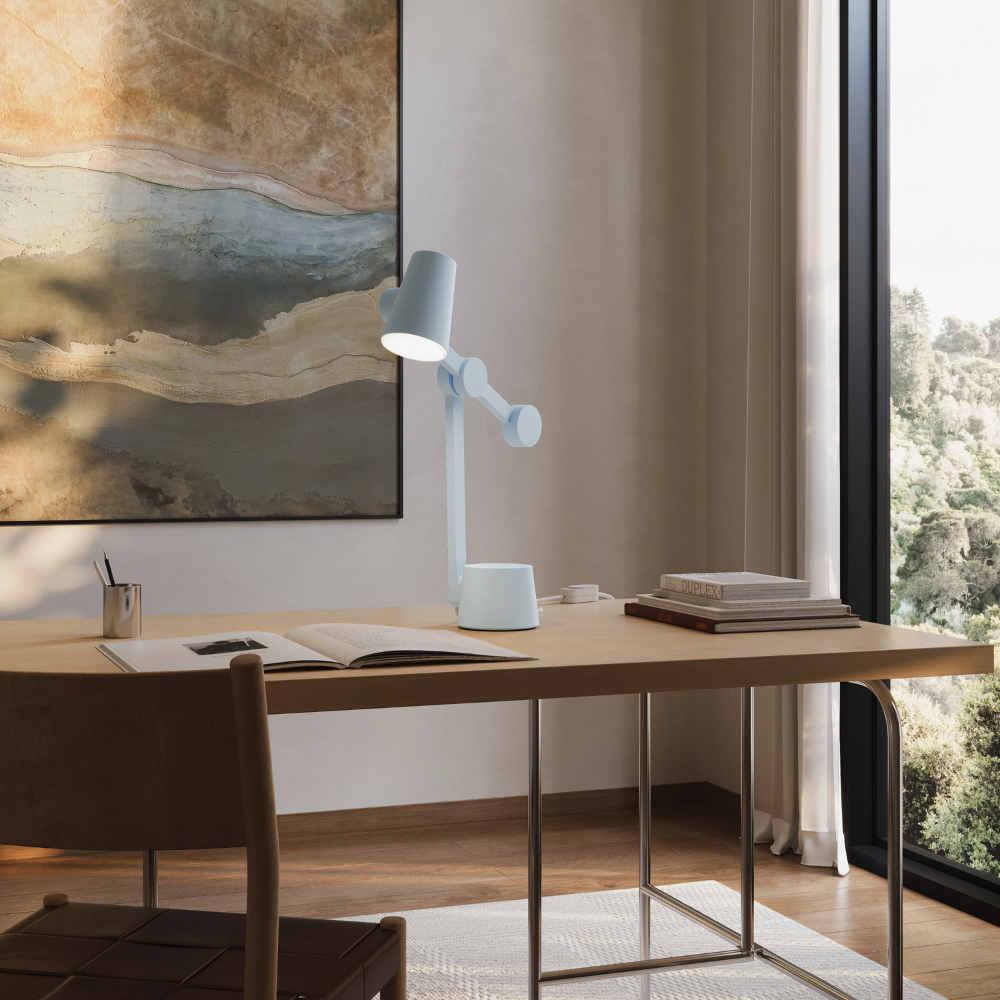The sky Aim Task Light from Gantri in a home office.