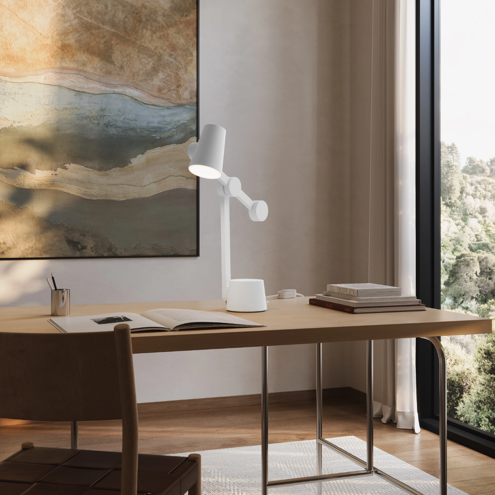 The snow Aim Task Light from Gantri in a home office.