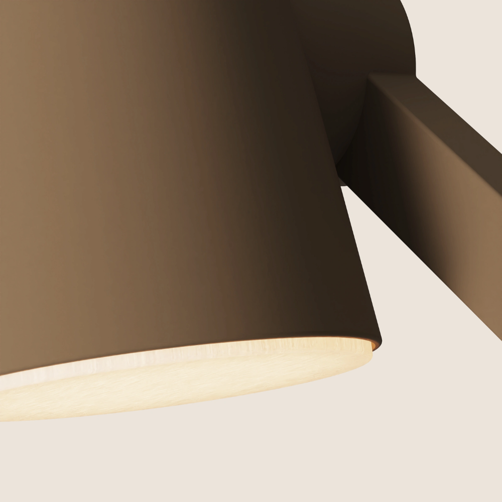 The walnut Aim Task Light from Gantri close up.