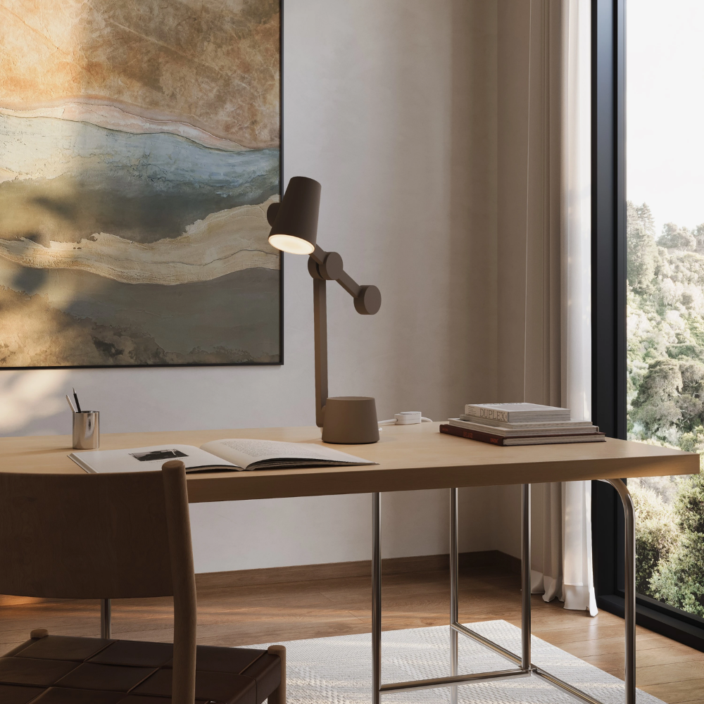 The walnut Aim Task Light from Gantri in a home office.