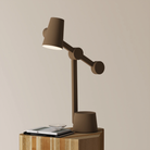 The walnut Aim Task Light from Gantri.