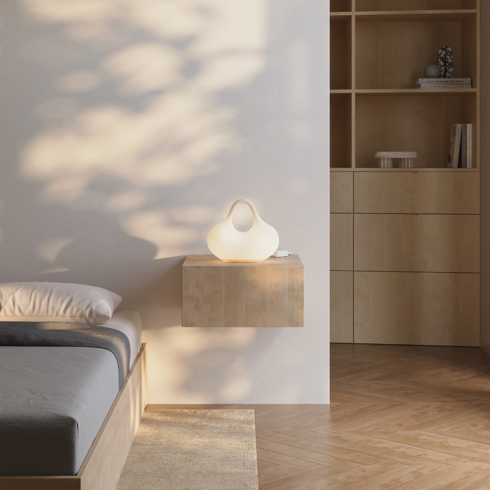 The Bag Table Light from Gantri in a primary bedroom.