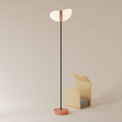 The blossom Baltra Floor Light from Gantri with the black rod option.