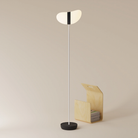 The carbon Baltra Floor Light from Gantri with the white rod option.