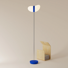 The cobalt Baltra Floor Light from Gantri with the chrome rod option.