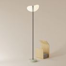 The meadow Baltra Floor Light from Gantri with the black rod option.