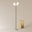 The mist Baltra Floor Light from Gantri with the black rod option.