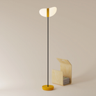 The mustard Baltra Floor Light from Gantri with the black rod option.
