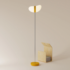 The mustard Baltra Floor Light from Gantri with the chrome rod option.