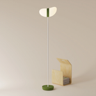 The olive Baltra Floor Light from Gantri with the white rod option.