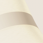 The peach Baltra Floor Light from Gantri close up.