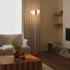 The poppy Baltra Floor Light from Gantri with the white rod option in a lounge.