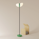 The sage Baltra Floor Light from Gantri with the black rod option.