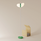 The sage Baltra Floor Light from Gantri with the white rod option.