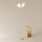 The sand Baltra Floor Light from Gantri with the white rod option.