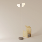 The smoke Baltra Floor Light from Gantri with the white rod option.
