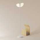 The snow Baltra Floor Light from Gantri with the white rod option.