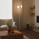 The walnut Baltra Floor Light from Gantri with the white rod option in a lounge.