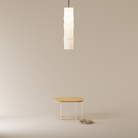 The Bamboo Large Pendant Light from Gantri with the black cord in a home office.