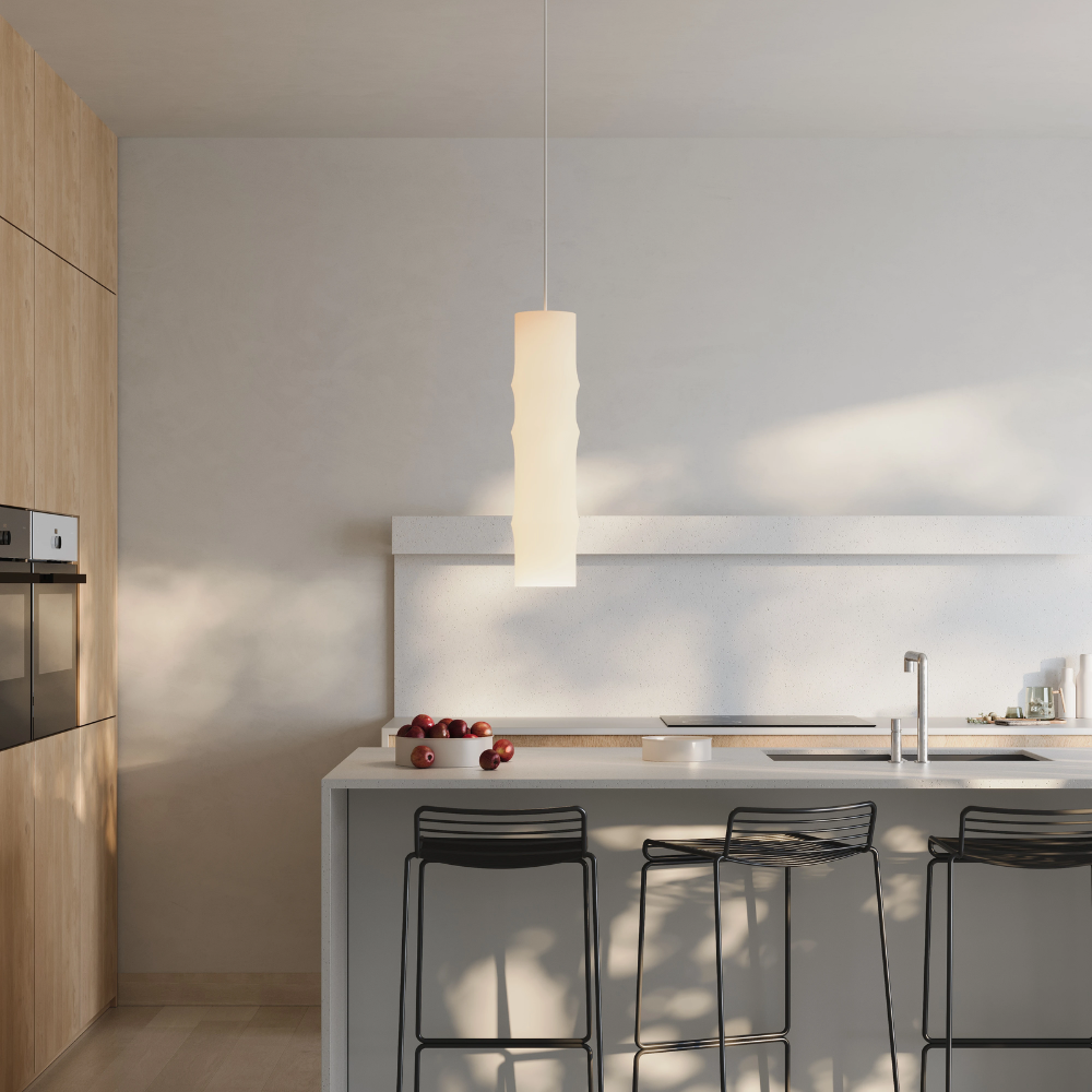 The Bamboo Large Pendant Light from Gantri with the white cord in a living space.