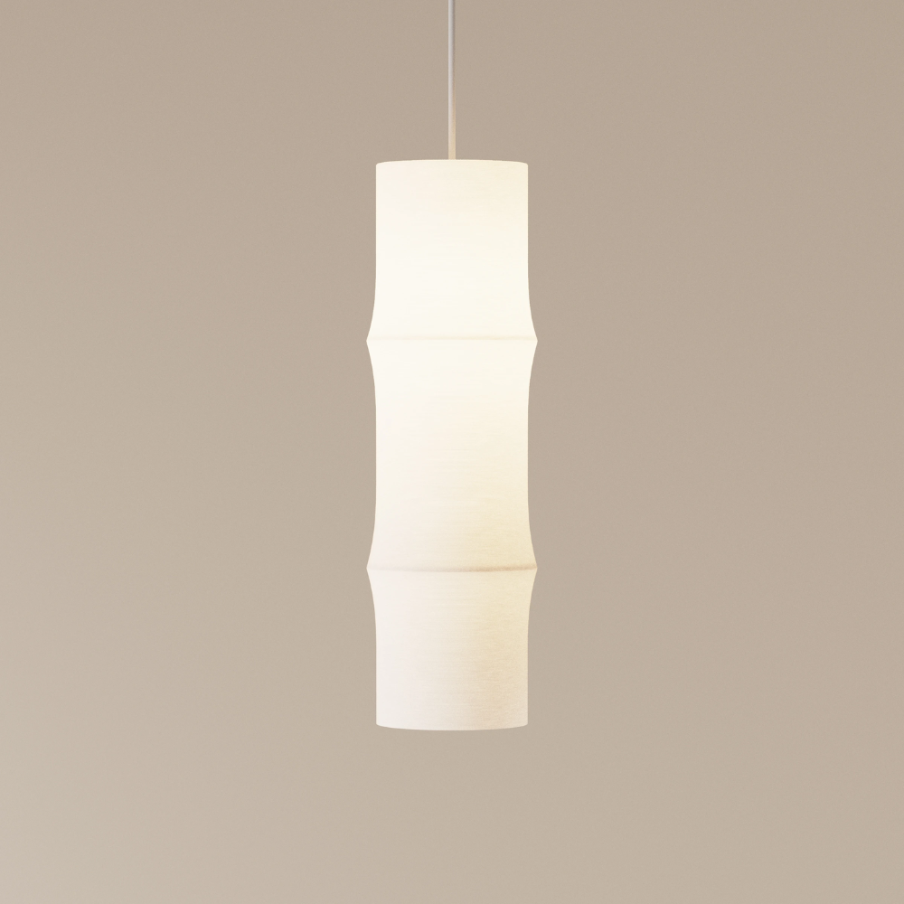 The Bamboo Medium Pendant Light from Gantri with the white cord in a studio.