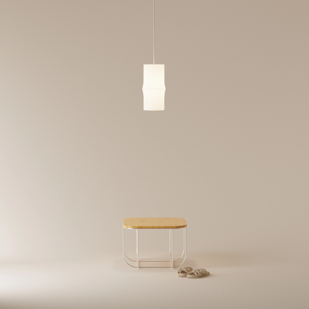 The Bamboo Small Pendant Light from Gantri with the white cord in a home office.