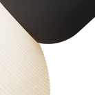 The carbon Buia Pendant Light from Gantri close up.